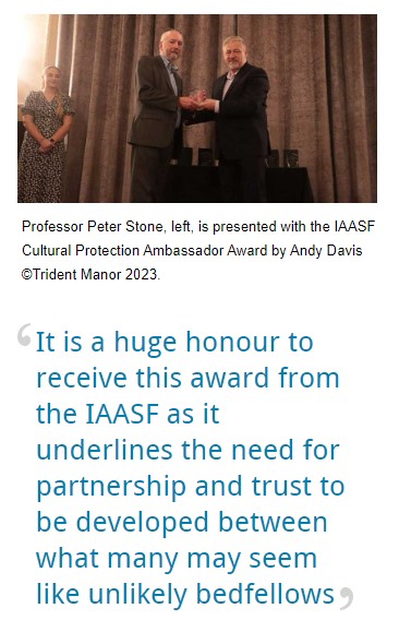 Professor Peter Stone, left, is presented with the IAASF Cultural Protection Ambassador Award by Andy Davis ©Trident Manor 2023.